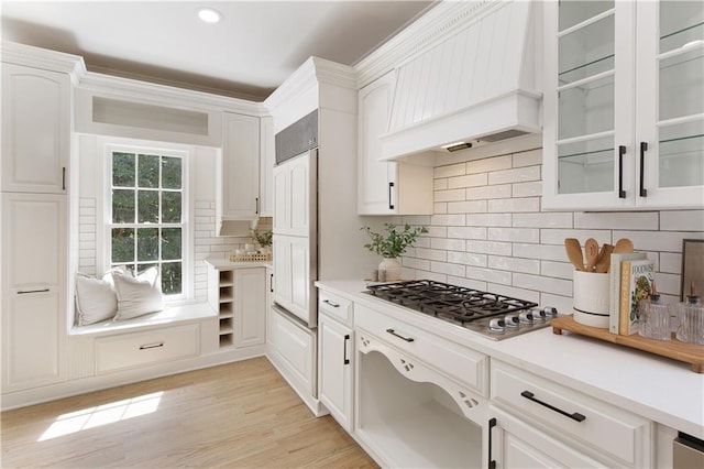 3795 Newport Bay Dr, Alpharetta, GA 30005 - kitchen with stainless steel gas cooktop, custom range hood, white cabinets, light countertops, and recessed lighting