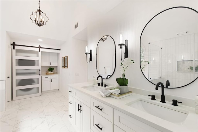3795 Newport Bay Dr, Alpharetta, GA 30005 - full bathroom featuring double vanity, marble look tiles, a shower, and a chandelier