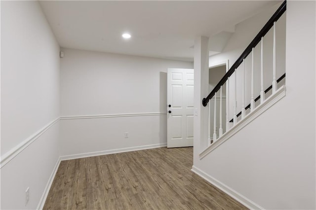 3795 Newport Bay Dr, Alpharetta, GA 30005 - spare room featuring wood finished floors, stairs, and recessed lighting