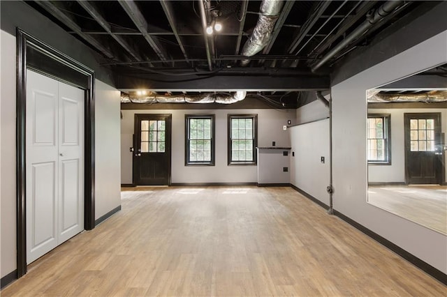3795 Newport Bay Dr, Alpharetta, GA 30005 - basement with light wood finished floors and baseboards