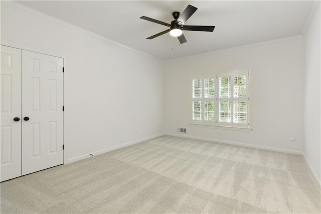 3795 Newport Bay Dr, Alpharetta, GA 30005 - unfurnished bedroom with ornamental molding, carpet flooring, a closet, and a ceiling fan