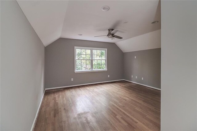 bonus room featuring vaulted ceiling, ceiling fan, and hardwood / wood-style floors