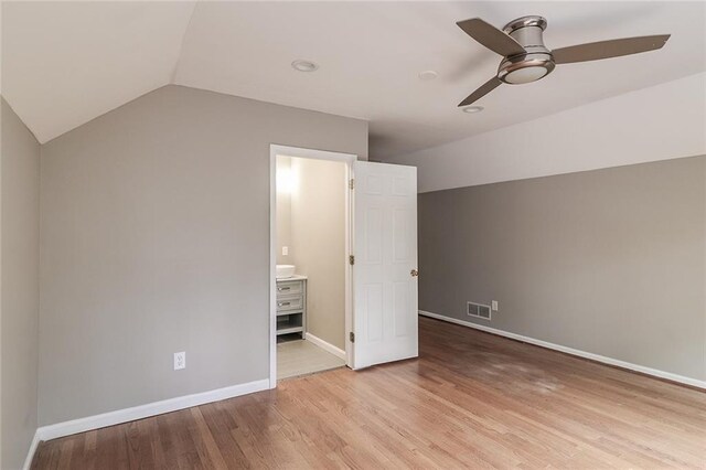 additional living space with ceiling fan, light hardwood / wood-style floors, and lofted ceiling