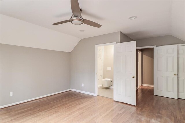 bonus room featuring vaulted ceiling, ceiling fan, and light wood-type flooring