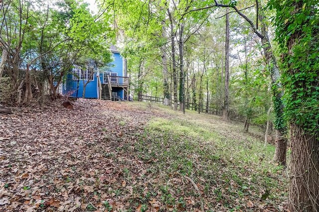 view of yard featuring a wooden deck