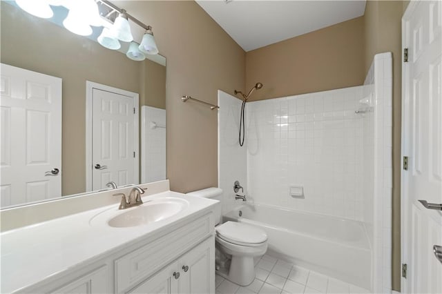 full bathroom with tile patterned flooring, vanity, toilet, and  shower combination