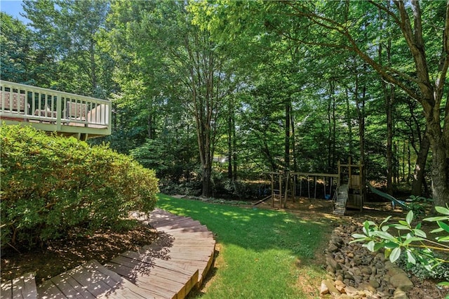 view of yard with a wooden deck