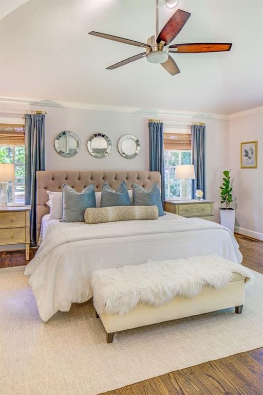 1343 Peachtree Battle Ave NW, Atlanta, GA 30327 - bedroom with ornamental molding, multiple windows, wood finished floors, vaulted ceiling, and ceiling fan