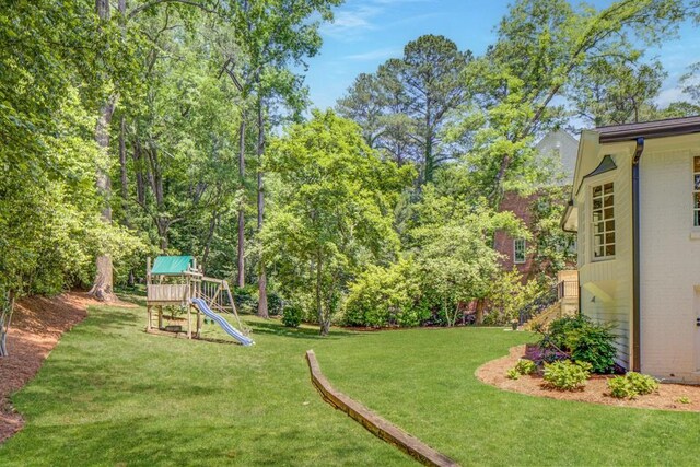 1343 Peachtree Battle Ave NW, Atlanta, GA 30327 - view of grassy yard featuring a playground and stairs