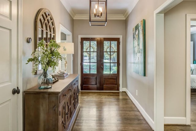 1343 Peachtree Battle Ave NW, Atlanta, GA 30327 - foyer entrance with dark wood-type flooring, crown molding, a chandelier, baseboards, and french doors