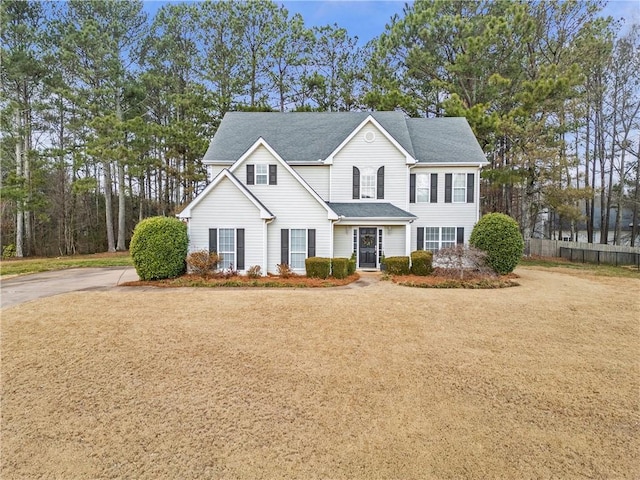 view of front of house with a front lawn