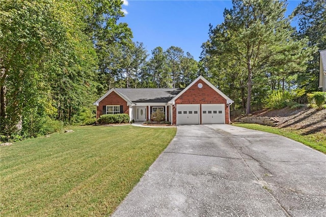 view of front of house with a garage and a front lawn