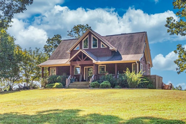 view of front of home featuring a porch and a front lawn