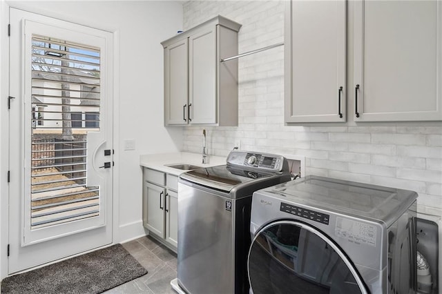 120 Nezhat Pl, Atlanta, GA 30350 - washroom featuring washer and dryer and cabinet space