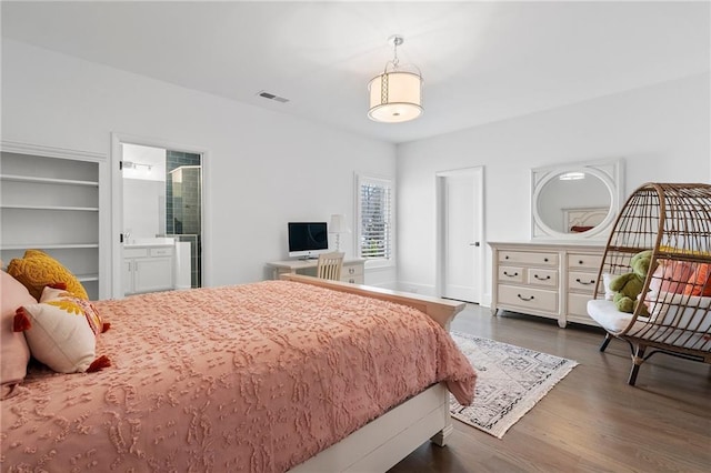 120 Nezhat Pl, Atlanta, GA 30350 - bedroom with dark wood finished floors and ensuite bathroom