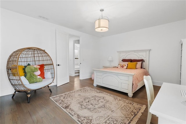 120 Nezhat Pl, Atlanta, GA 30350 - bedroom featuring dark wood-style flooring and baseboards