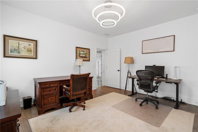 120 Nezhat Pl, Atlanta, GA 30350 - office with a chandelier, wood finished floors, and baseboards
