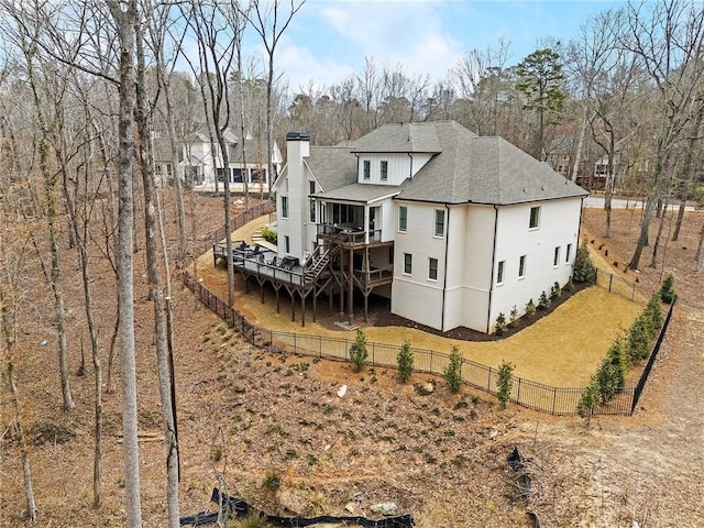 120 Nezhat Pl, Atlanta, GA 30350 - back of property featuring a chimney, a fenced backyard, a shingled roof, stairway, and a deck