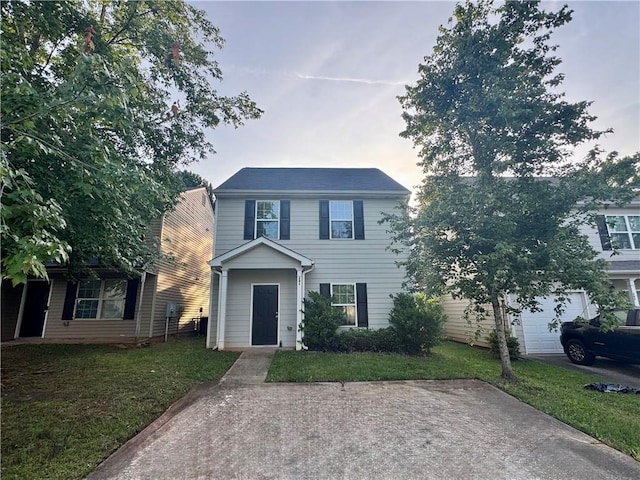 241 Coral Cir, Mcdonough, GA 30253 - view of front of property with a front yard