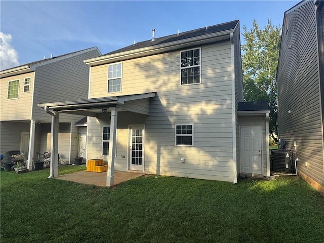 241 Coral Cir, Mcdonough, GA 30253 - back of property with a patio and a yard