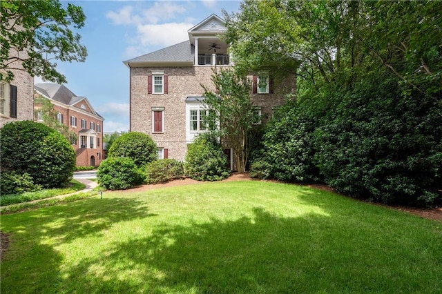 2283 Falmouth Ct SE Unit 22, Smyrna, GA 30080 - view of green lawn featuring a ceiling fan