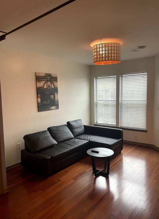 living room featuring wood-type flooring