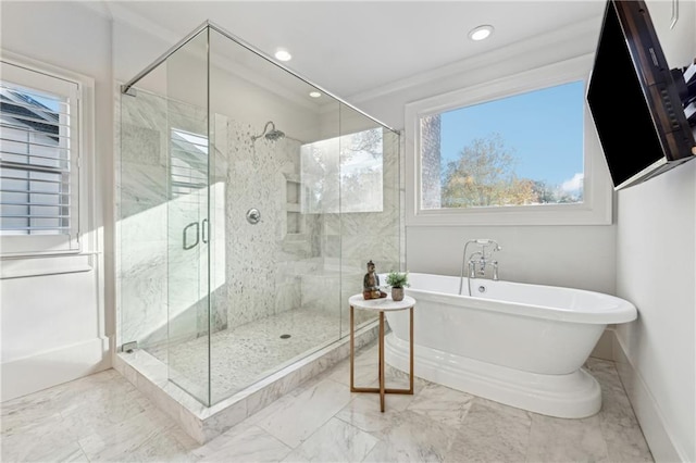 bathroom with independent shower and bath and ornamental molding