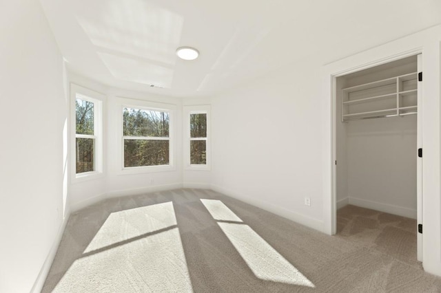 2410 Glade Overlook, Cumming, GA 30041 - unfurnished bedroom with carpet floors, a spacious closet, and a closet