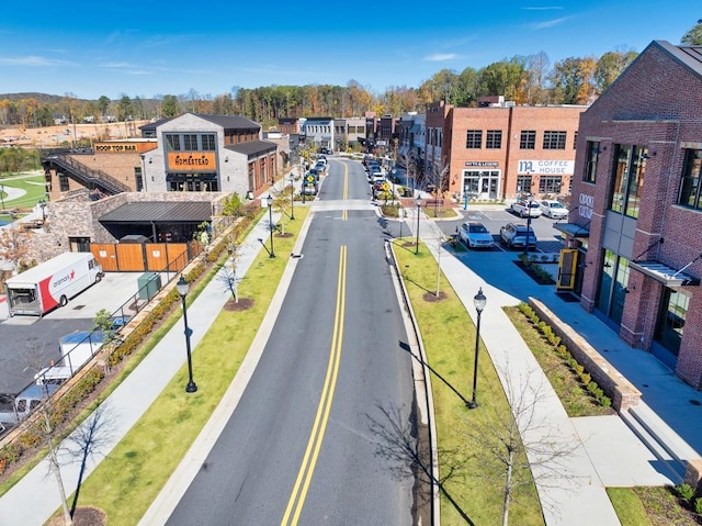 2410 Glade Overlook, Cumming, GA 30041 - view of asphalt road featuring sidewalks, street lighting, curbs, and a residential view