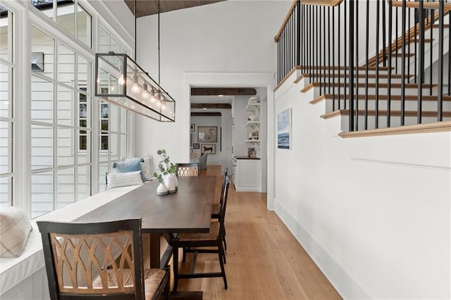 1141 Ragley Hall Rd NE, Brookhaven, GA 30319 - stairs featuring a healthy amount of sunlight, a towering ceiling, and a notable chandelier