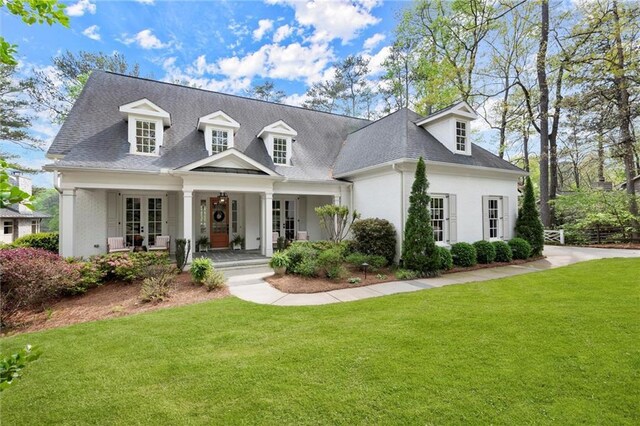 1141 Ragley Hall Rd NE, Brookhaven, GA 30319 - back of property featuring a sunroom, stairway, a balcony, a patio area, and a chimney