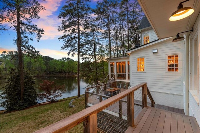 1141 Ragley Hall Rd NE, Brookhaven, GA 30319 - living area with healthy amount of natural light, beamed ceiling, light wood-type flooring, recessed lighting, and a chandelier