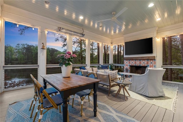 1141 Ragley Hall Rd NE, Brookhaven, GA 30319 - sunroom / solarium with an outdoor living space with a fireplace and ceiling fan