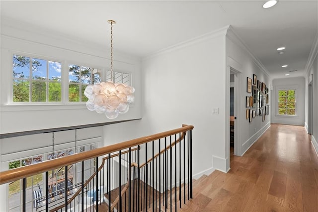 1141 Ragley Hall Rd NE, Brookhaven, GA 30319 - hallway featuring baseboards, recessed lighting, a chandelier, an upstairs landing, and wood finished floors