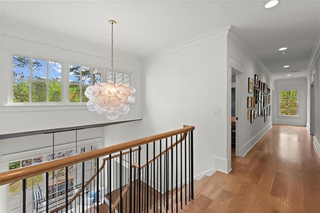 1141 Ragley Hall Rd NE, Brookhaven, GA 30319 - corridor with an upstairs landing, a chandelier, baseboards, wood finished floors, and recessed lighting
