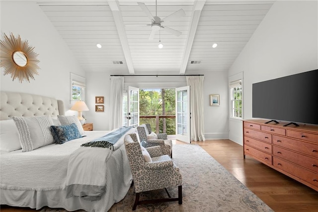 1141 Ragley Hall Rd NE, Brookhaven, GA 30319 - bedroom featuring wood finished floors, baseboards, vaulted ceiling with beams, and visible vents