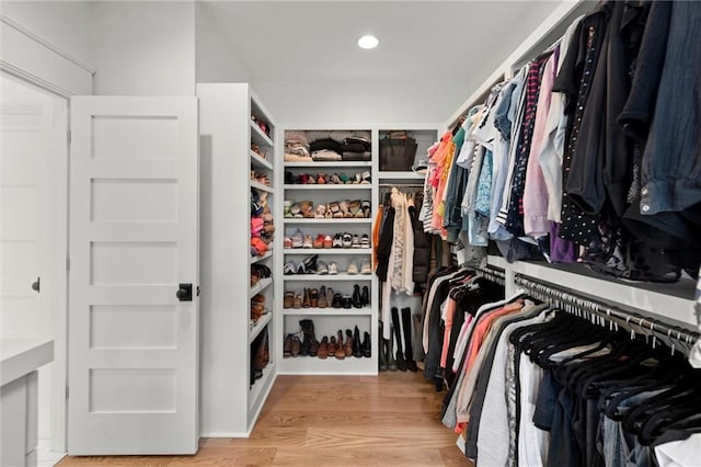 1141 Ragley Hall Rd NE, Brookhaven, GA 30319 - walk in closet with light wood-style floors