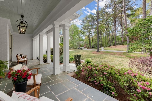 1141 Ragley Hall Rd NE, Brookhaven, GA 30319 - view of patio / terrace featuring covered porch