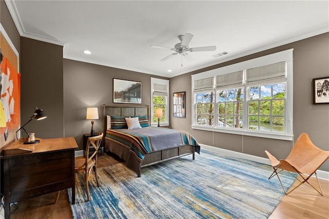 1141 Ragley Hall Rd NE, Brookhaven, GA 30319 - bedroom with wood finished floors, visible vents, crown molding, and baseboards