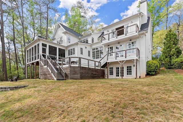 1141 Ragley Hall Rd NE, Brookhaven, GA 30319 - back of property with french doors, a sunroom, a chimney, and stairs