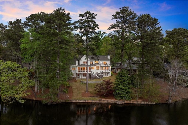 1141 Ragley Hall Rd NE, Brookhaven, GA 30319 - back of property featuring a lawn, stairway, a water view, and a balcony