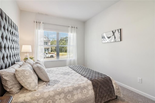 11113 Suria Dr, Covington, GA 30014 - bedroom with carpet floors and baseboards