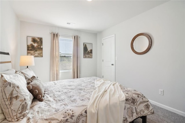 11113 Suria Dr, Covington, GA 30014 - carpeted bedroom featuring baseboards