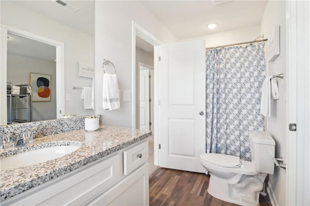 11113 Suria Dr, Covington, GA 30014 - bathroom with vanity, wood finished floors, and curtained shower