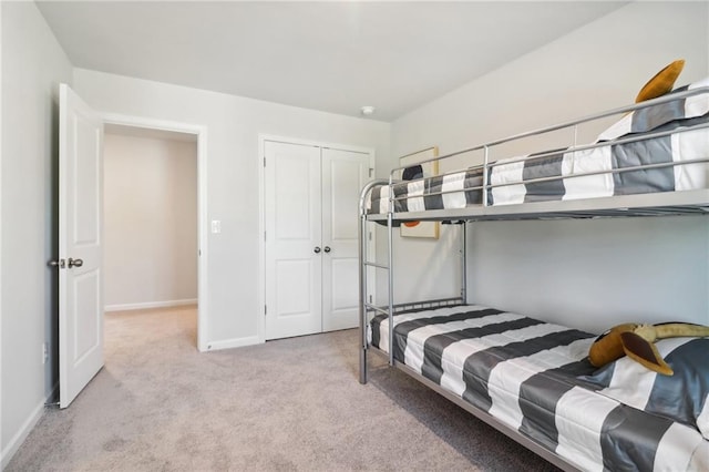 11113 Suria Dr, Covington, GA 30014 - bedroom with light colored carpet and a closet