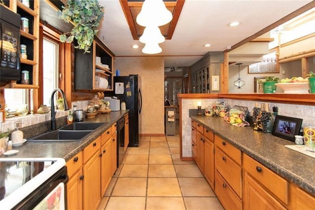 kitchen with open shelves, dark countertops, a sink, dishwasher, and light tile patterned floors
