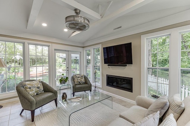 3219 Parkridge Cres, Chamblee, GA 30341 - living area with healthy amount of natural light, french doors, and light tile patterned floors