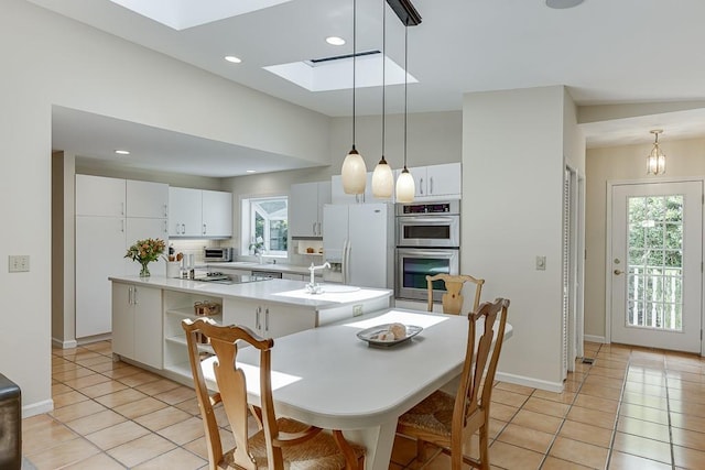 3219 Parkridge Cres, Chamblee, GA 30341 - dining room featuring a skylight and light tile patterned floors