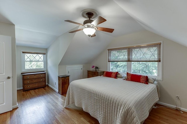 3219 Parkridge Cres, Chamblee, GA 30341 - bedroom featuring light wood finished floors, vaulted ceiling, and a ceiling fan