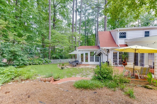 3219 Parkridge Cres, Chamblee, GA 30341 - rear view of house featuring a patio area and view of scattered trees